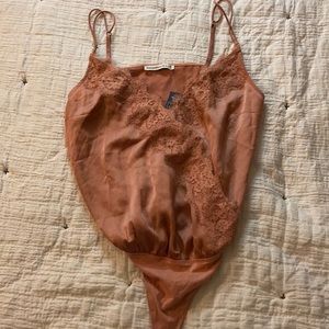 Satin bodysuit with lace trim